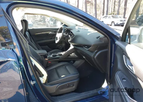 2023 Buick Envision Essence Fwd z USA, uszkodzony, nr VIN LRBFZNR44PD055703